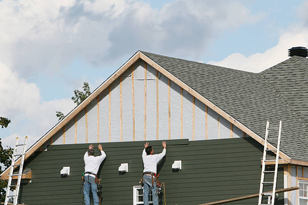 Professional Siding technician working in Pinehurst, TX